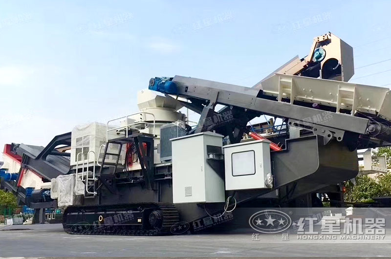 移動夾石機